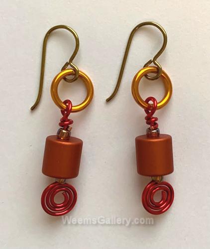Earrings Orange cylinder by Carolyn Henderson